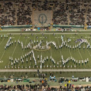 Marching Band pictured at half-time Thanking Dean Ann Gill