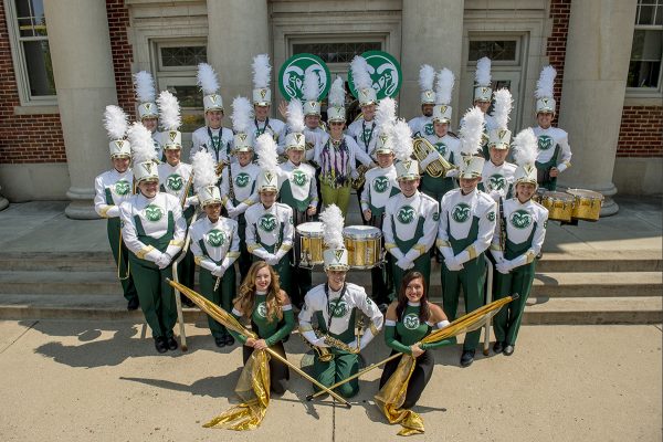 CSU Marching Band members pictured with Dame Jackie