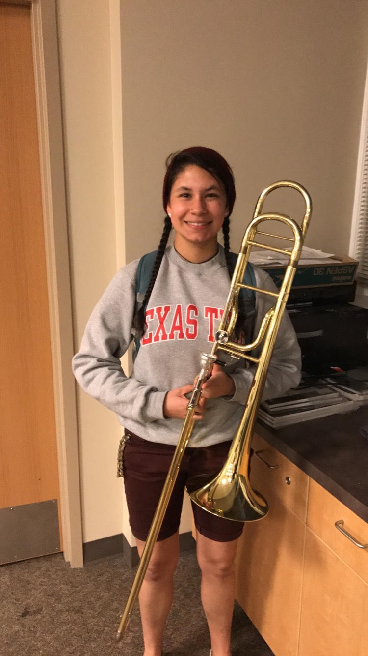 Caylyn Ysabel Newcomb pictured with her trombone