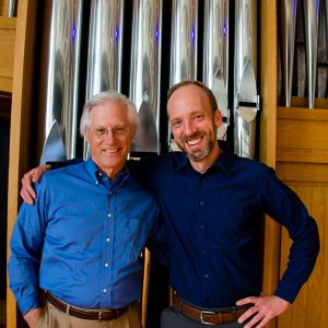 Wes Kenney and Joel Bacon pictured in front of the Casavant Organ at CSU