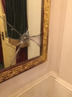 Mirror in Opera House with bullet hole