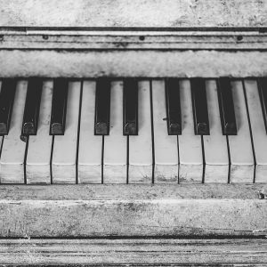 Old photo of a piano keyboard