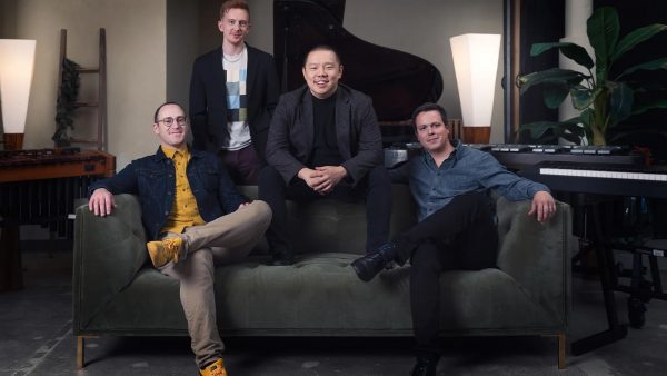 Promotional photo of the Icarus Quartet seated on a couch.