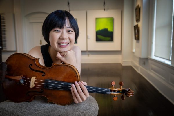 2026 Guest Artist Tze Ying promotional headshot with viola
