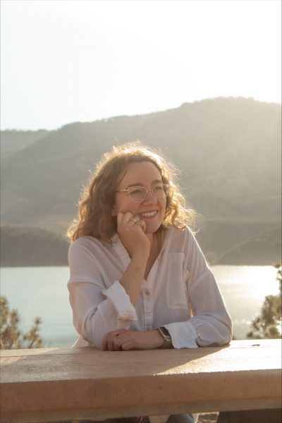 2026 Spur CSU Student Teaching Artist Tirzah Rowe pictured with hills and sunshine behind her